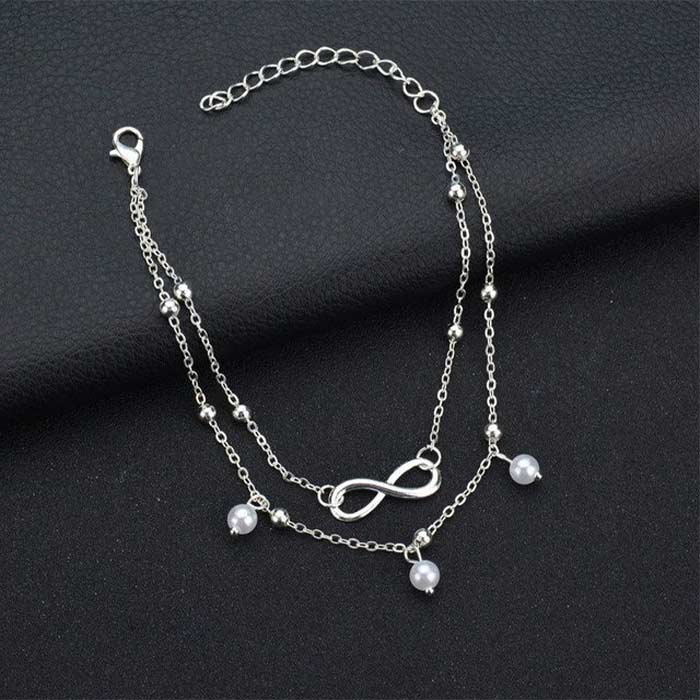 This leg bracelet is adjustable in length, so it fits all ankles perfectly