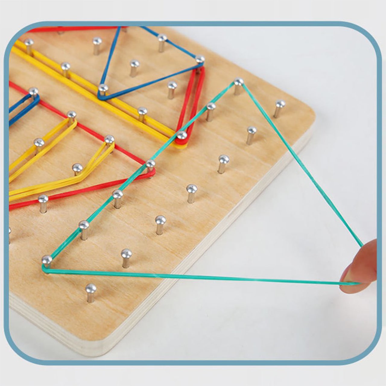 The mind game includes a wooden board with pegs, cards with drawn characters, elastic bands and a bell to be rung by the player who finishes first!