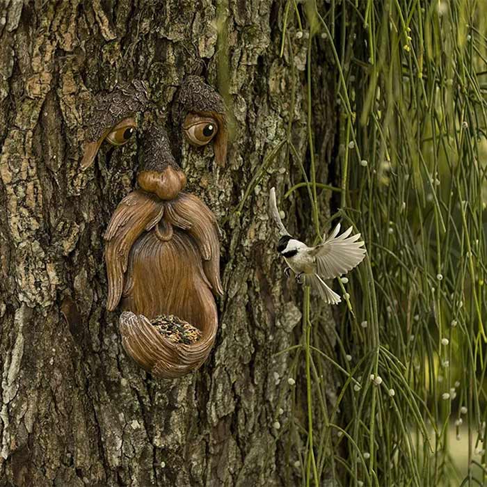 BirdFeeder, a tree decoration in the shape of a face that is also a bird feeder - Image 5