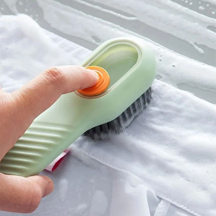 The brush has an opening where you pour the cleaning detergent!