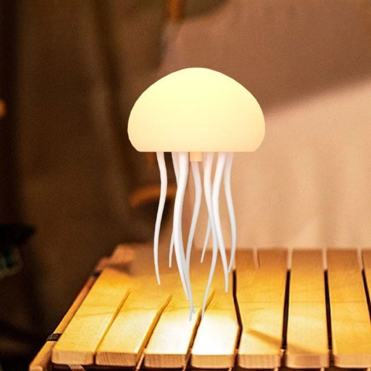 The tentacles move, which gives the coloured light an additional calming effect.