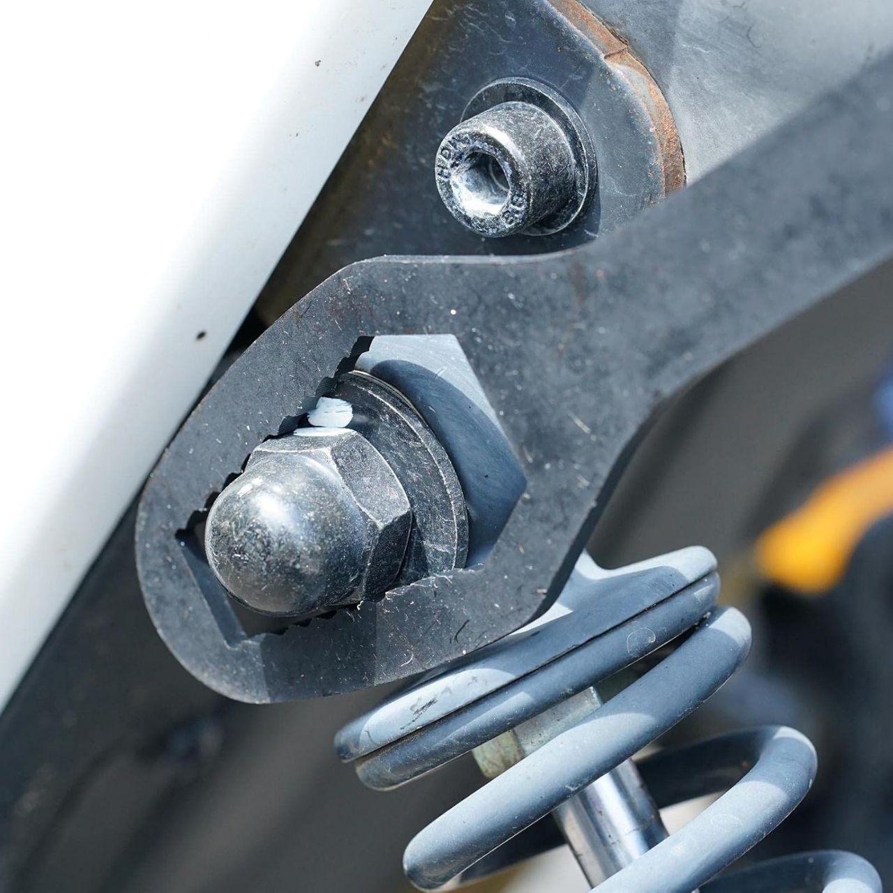 The Universal Wrench is made of hardened steel and designed for long-lasting use.