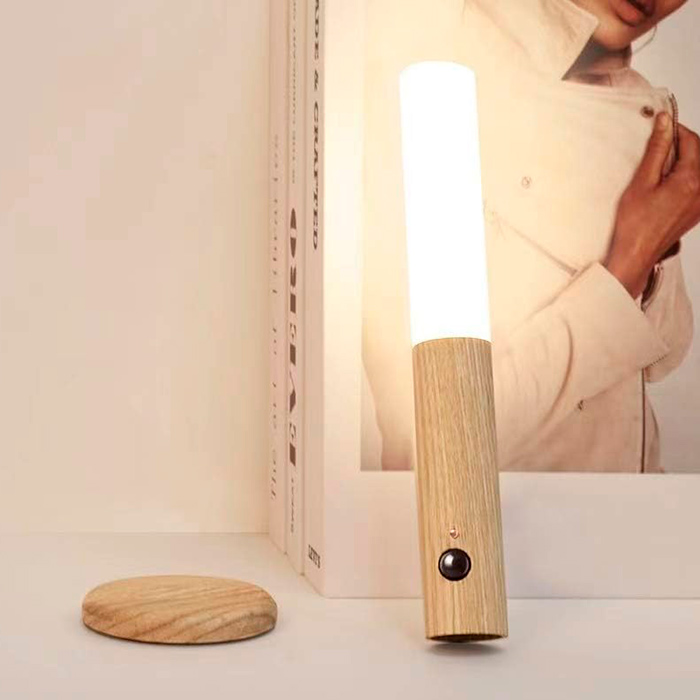 The lamp has a holder that you attach it to with a magnet, and the holder has a self-adhesive backing, so you can place it anywhere you like - in the hallway, in the bedroom, on the desk, on the edge of the bed, etc.
